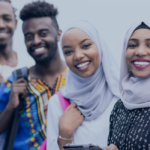 Are students in a foreign country considered migrants?